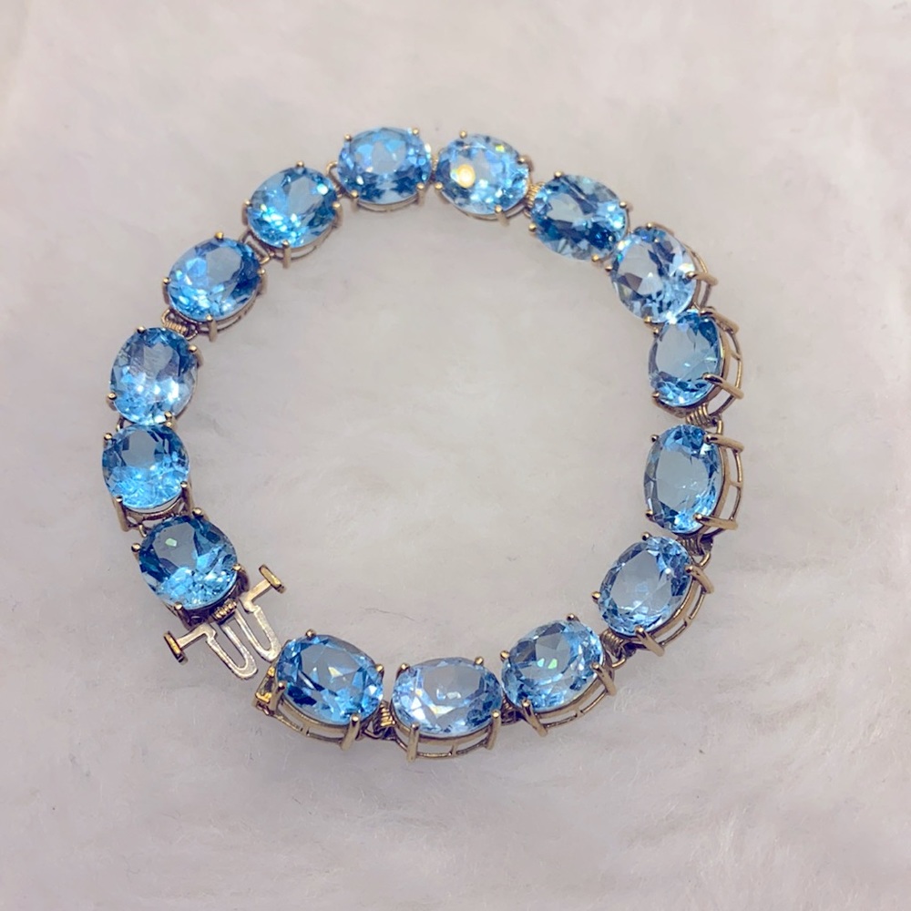 COPY - VINTAGE & SIGNED 10k gold Sky Blue Topaz Bracelet ( 15 Gems)